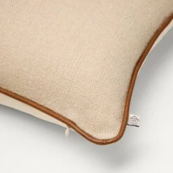 18"x18" Solid Chambray With Faux Leather Trim Square Throw Pillow Beige/Brown - Hearth & Hand™ With Magnolia -Hearth & Hand With Magnolia GUEST 95a7c731 79dd 409c b1b1 c80ec9d336a2